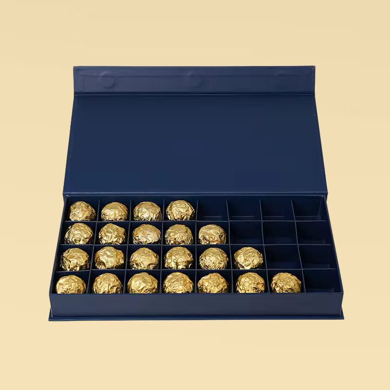 32 empty truffle boxes with inserts